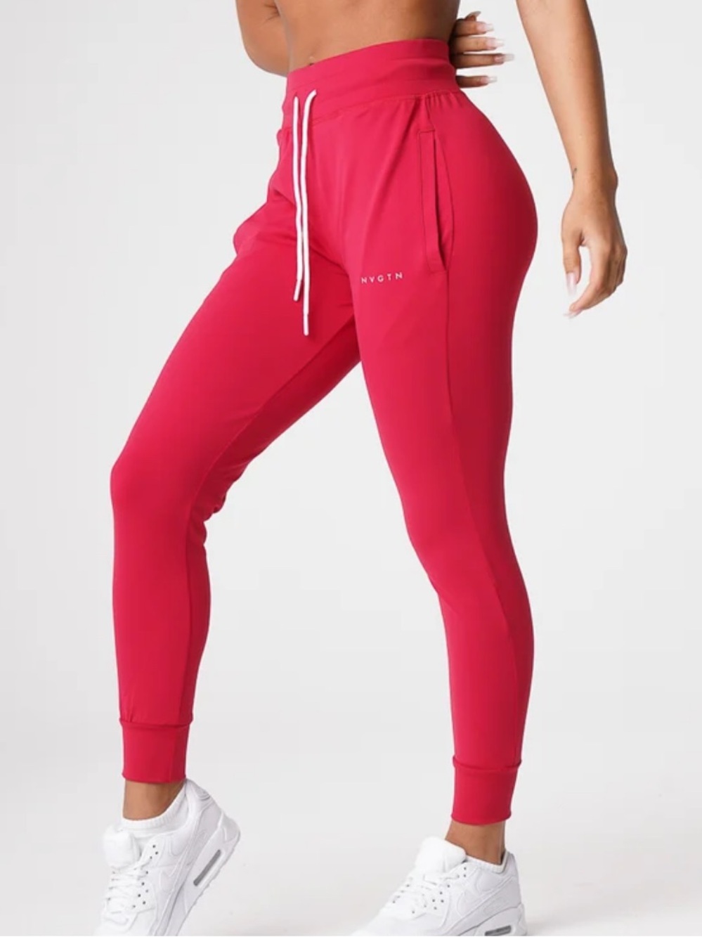 NVGTN women’s ruby red Jogger Sweatpants with White Drawstring sz M fitted